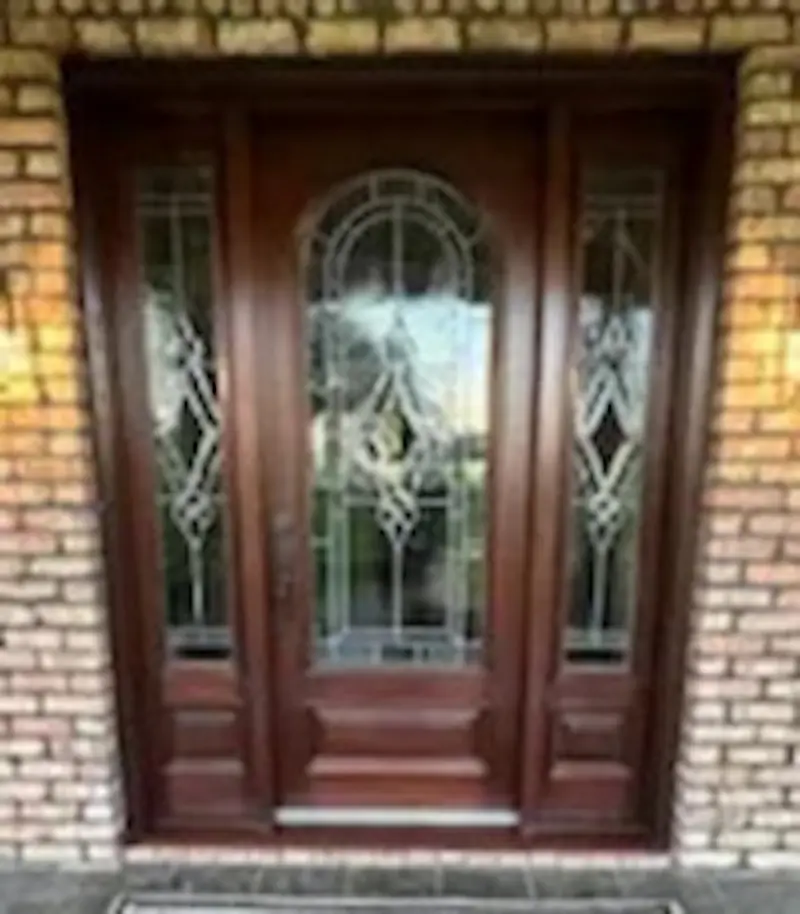 Restored oak front door after refinishing