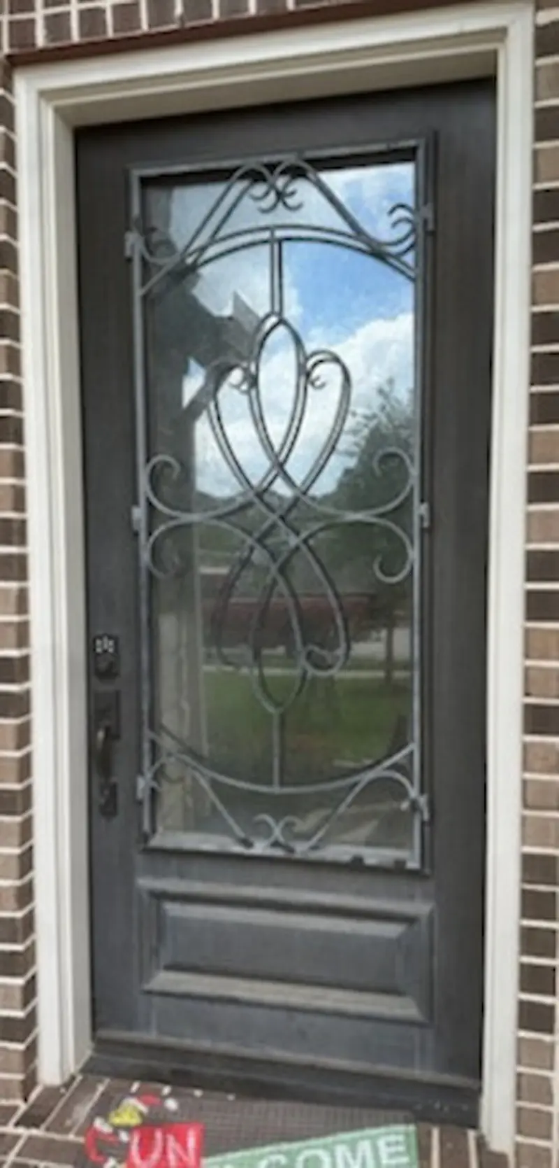 Weathered oak front door before refinishing
