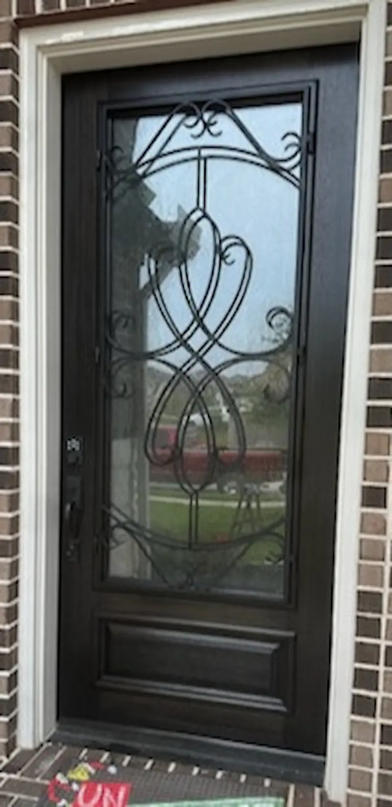 Restored oak front door after refinishing